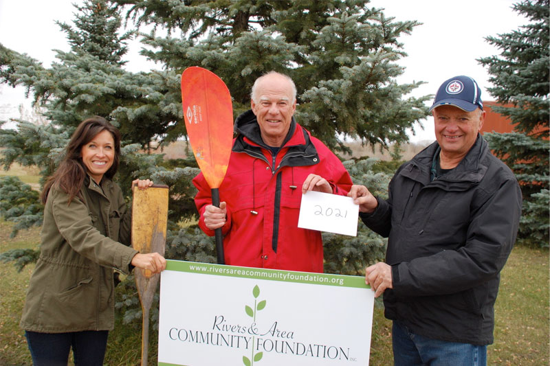 Treasurer Samantha Lepp and president Ed MacKay accepted the presentation from RACF Director & Treasurer Rod Veitch.