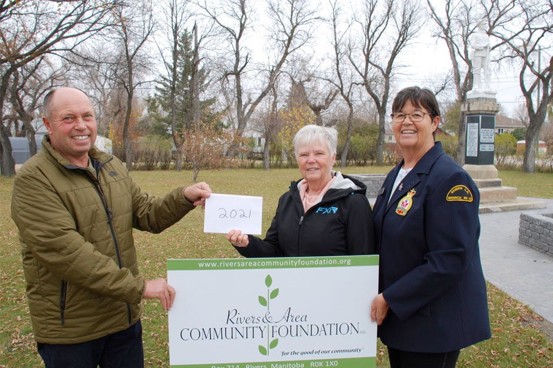 RACF Director Ed Shaw made the presentation to Legion Aux treasurer Marilyn Halliday and president Donna Falkevitch.