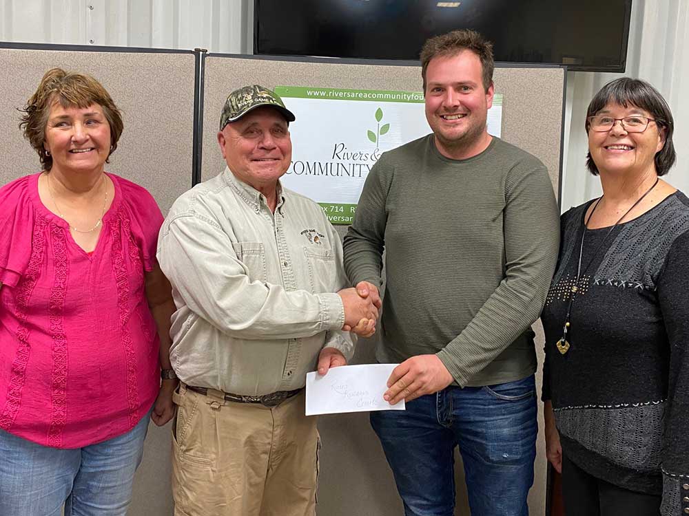RACF 2022 Grant Presentation - Adrienne & Roger Beaudin; Rivers Game and Fish, Max Sprenger; and RACF Director, Donna Falkevitch - Sibbald Legacy Fund