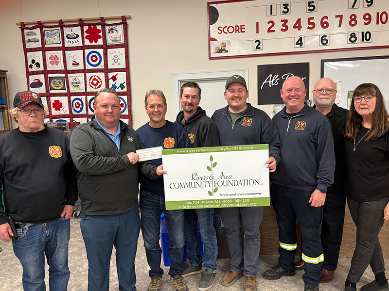 RACF presents their 2024 grant to the Rivers Fire Fighters Association. L-R: Byron McMurchy, AaronTycoles (Director), Jim Duthie, Brayden Johnson, Robby Brown, David Creighton, Al Morken, and Donna Morken