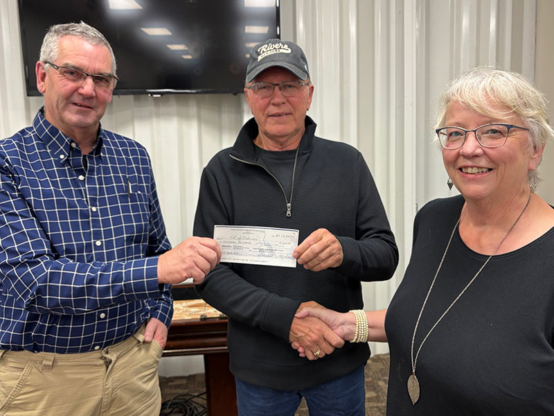 RACF presents their 2024 grant to White Bank Lea Cemetery. L-R: Jack Stewart, Lawrence McFarlane (Director), and Sharon Simms.