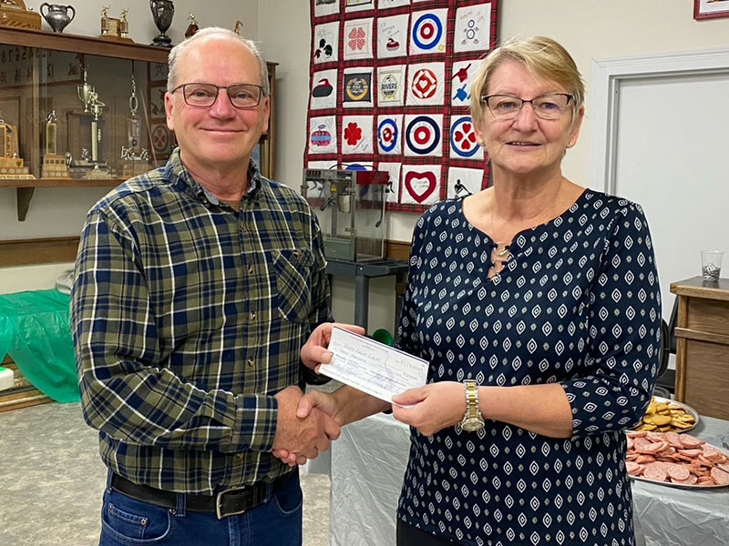 RACF presents their 2024 grant to Rivers Legion Ladies. L-R: Gerry Gourlay (Director) and Jane Brown.